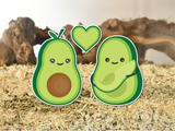 Furnishables avocado themed static cling stickers stuck to the front of a glass pet habitat