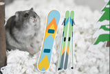Hamster with Furnishables static cling sticker of a pair of skis and snowboard stuck to the front of a glass habitat